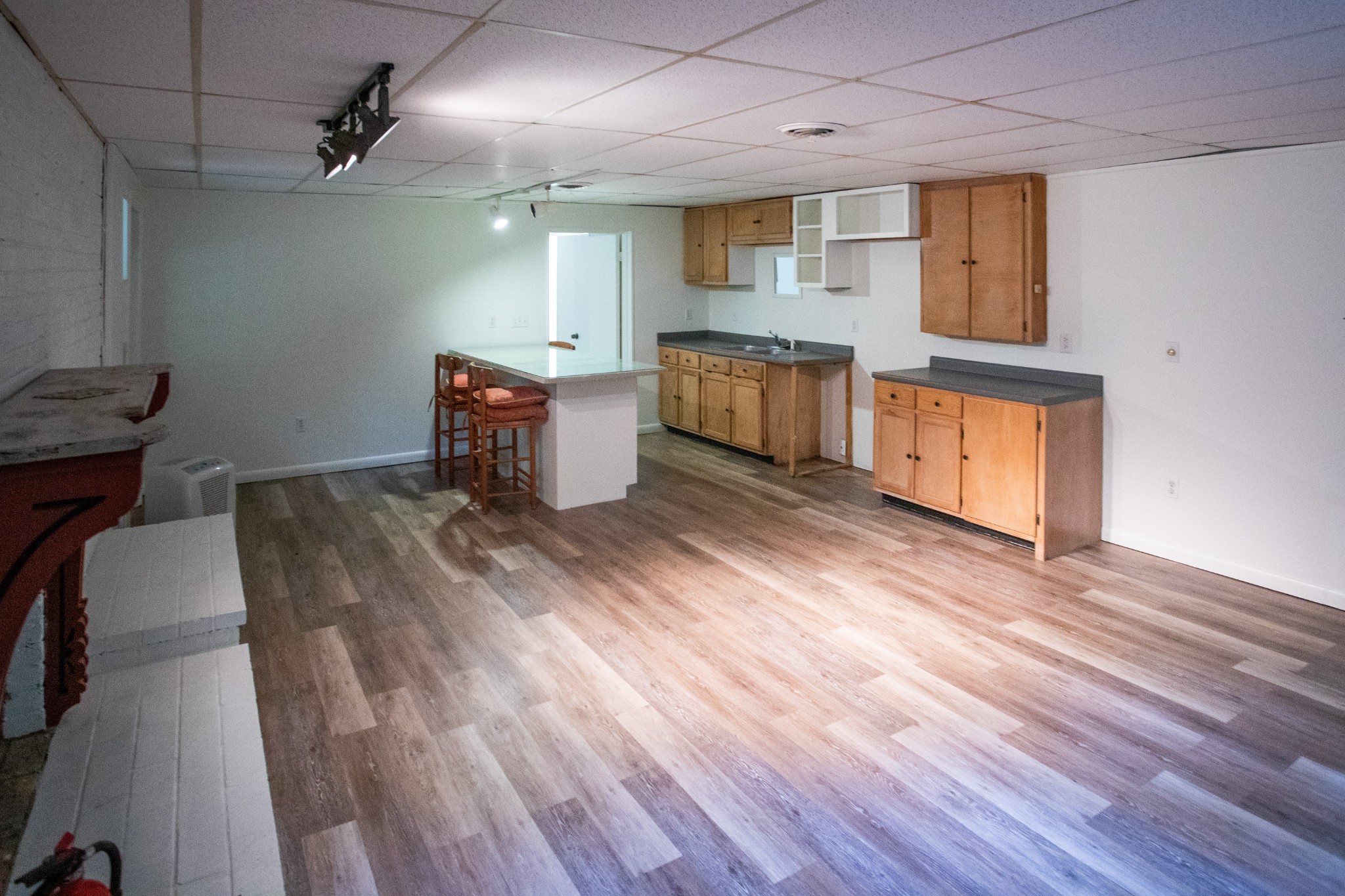 283 Green's View Road Sewanee, TN 37375 - Photo 46 of 50 a kitchen with granite countertop a stove a sink and a microwave