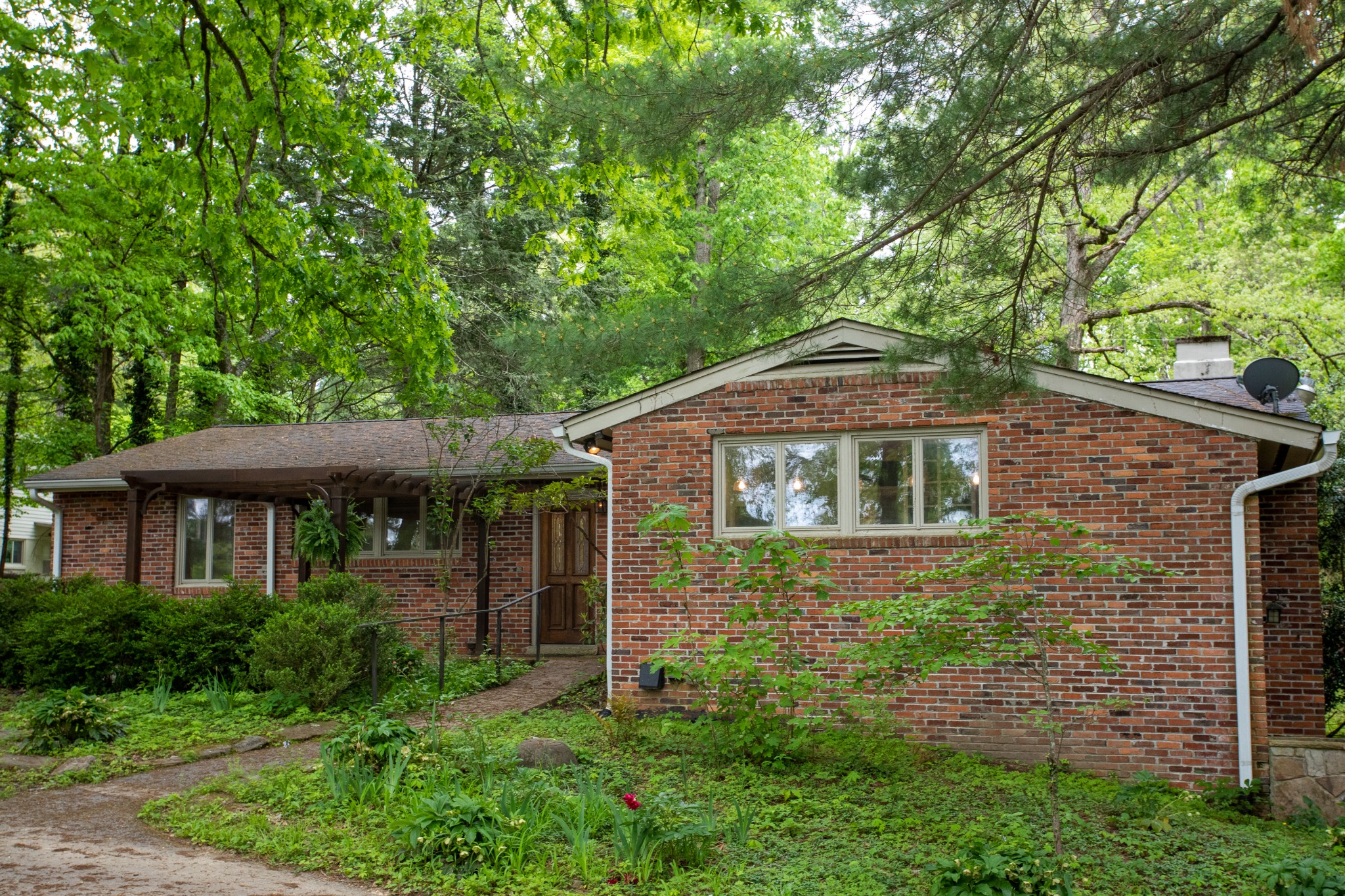 283 Green's View Road Sewanee, TN 37375 - Photo 48 of 50 a front view of a house with a yard
