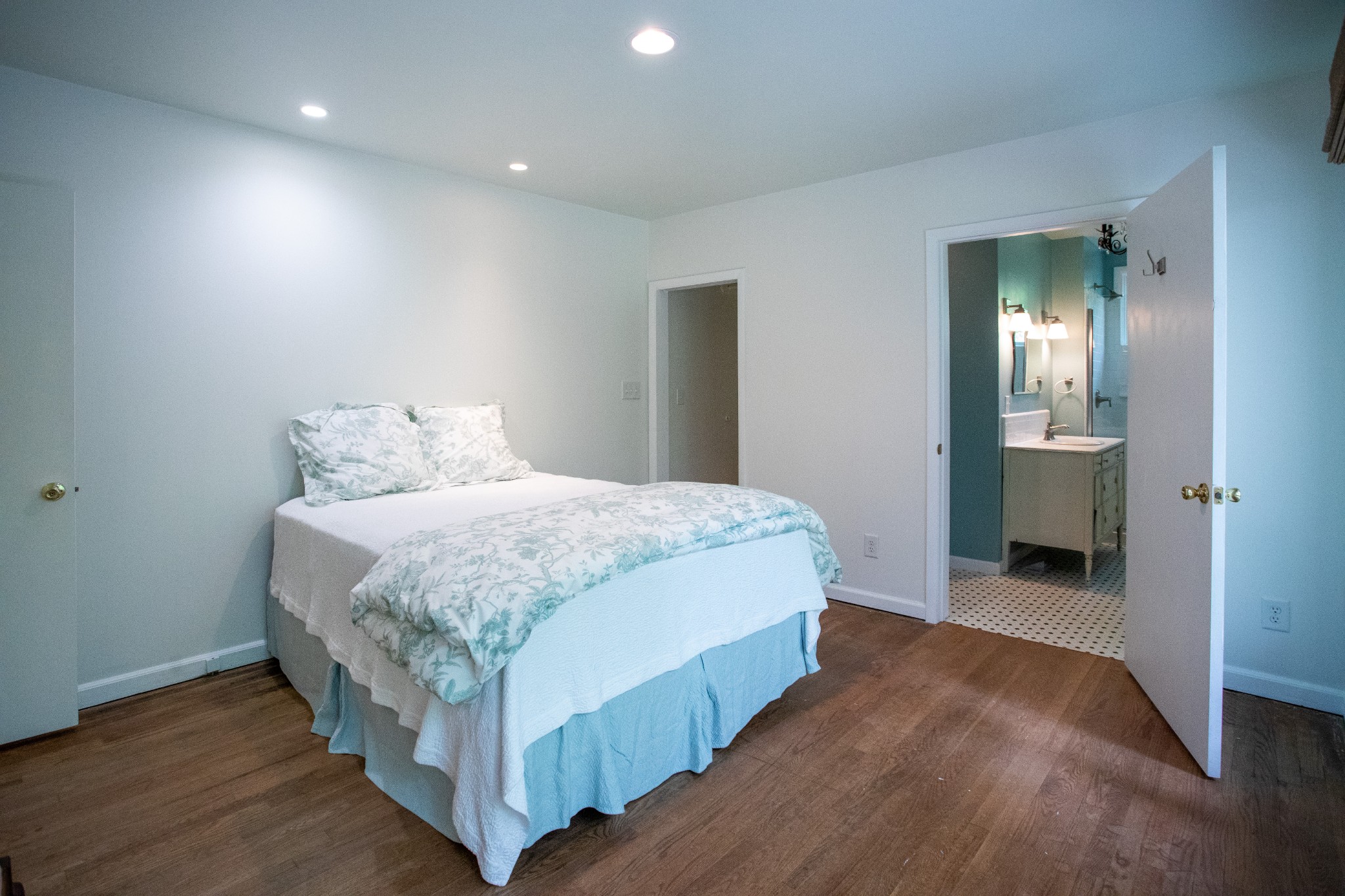 283 Green's View Road Sewanee, TN 37375 - Photo 6 of 50 a spacious bedroom with a bed and a table