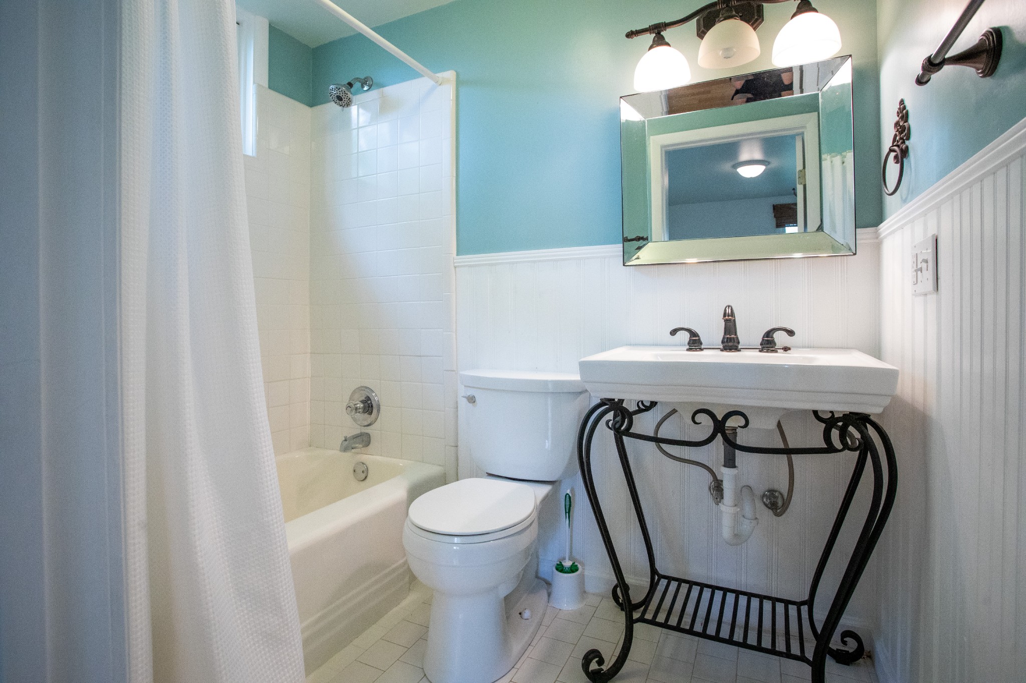 283 Green's View Road Sewanee, TN 37375 - Photo 7 of 50 a bathroom with a toilet sink and mirror