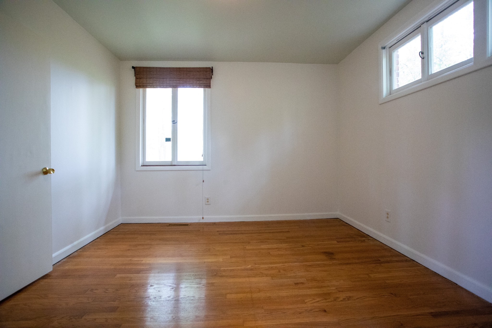 283 Green's View Road Sewanee, TN 37375 - Photo 8 of 50 an empty room with wooden floor and windows