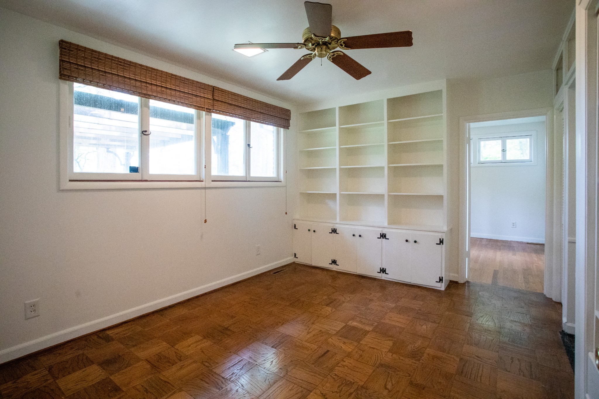 283 Green's View Road Sewanee, TN 37375 - Photo 10 of 50 an empty room with cabinet and windows