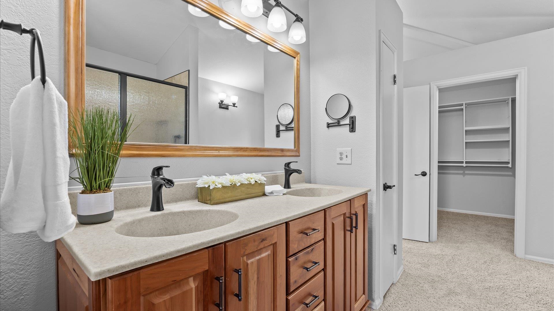 2262 Tanglewood Road Grand Junction, CO 81507 - Photo 14 of 27 a bathroom with a sink and a mirror
