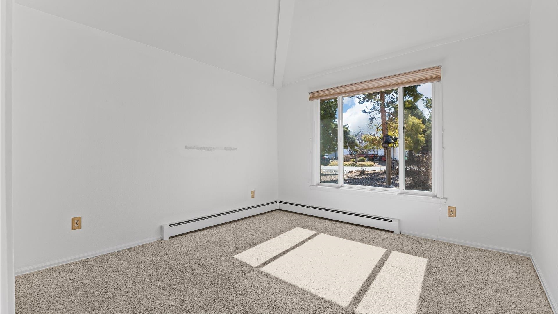 2262 Tanglewood Road Grand Junction, CO 81507 - Photo 16 of 27 an empty room with windows