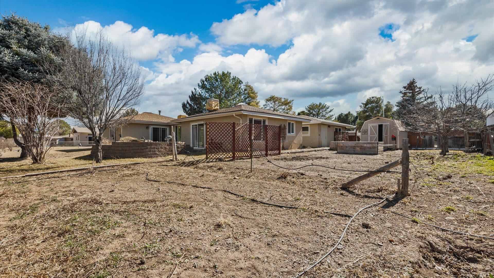 2262 Tanglewood Road Grand Junction, CO 81507 - Photo 27 of 27 a view of a house with a yard covered in snow