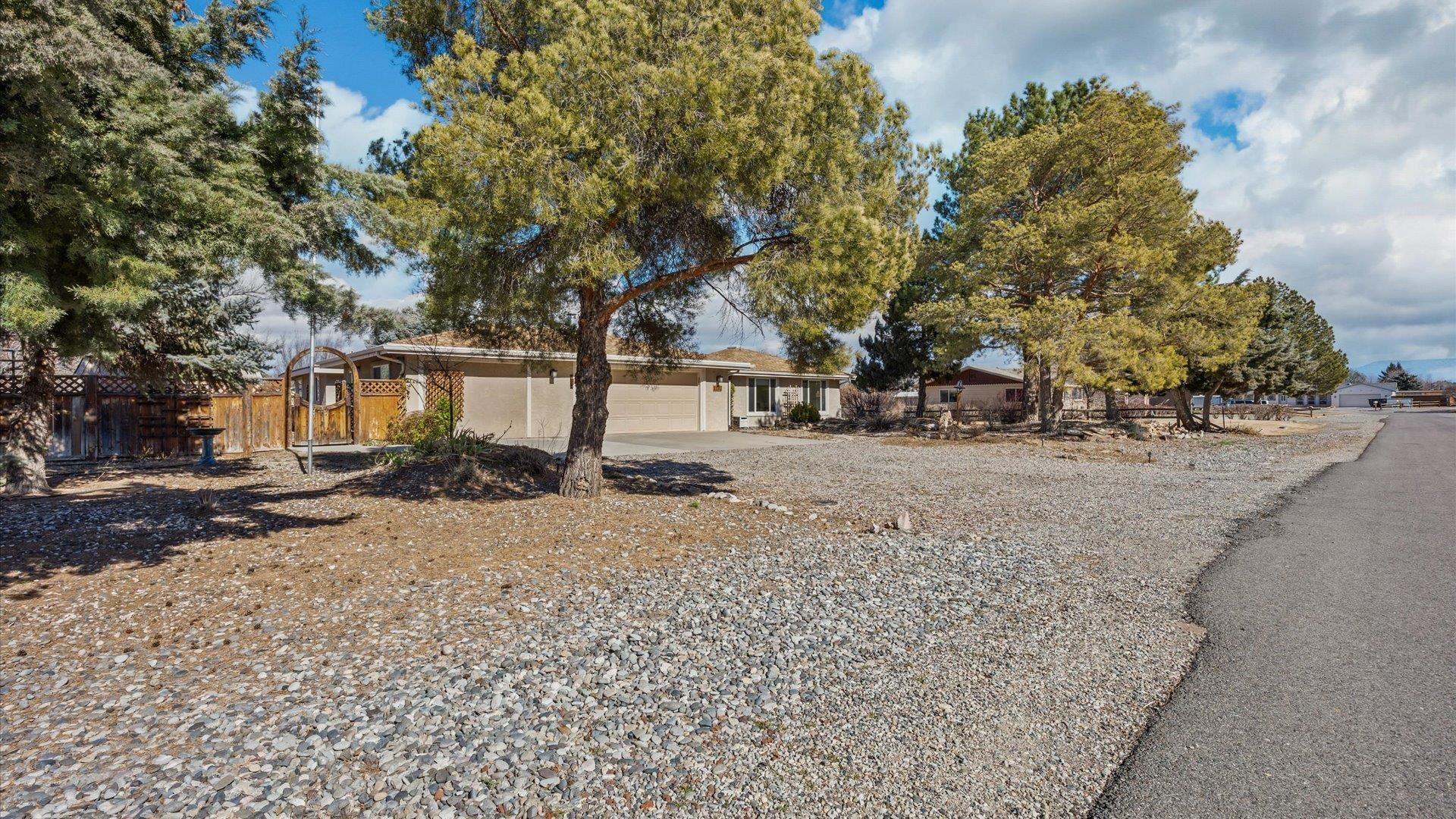 2262 Tanglewood Road Grand Junction, CO 81507 - Photo 3 of 27 a view of road with trees