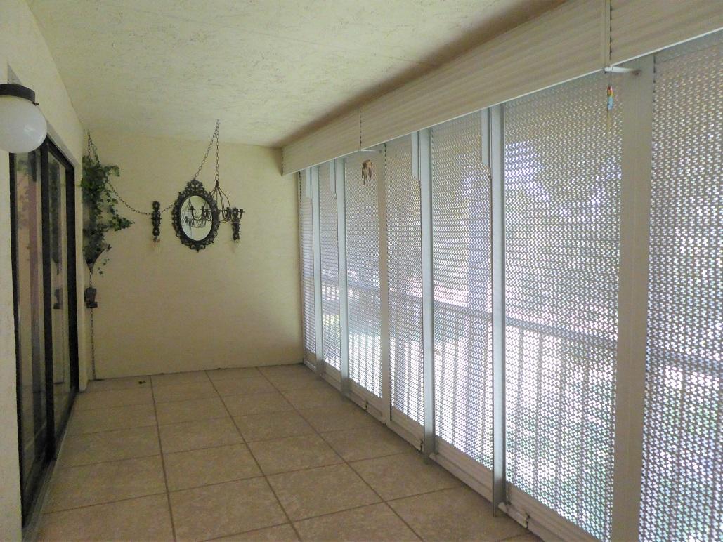 602 Pinecrest Circle, Unit B Jupiter, FL 33458 - Photo 15 of 19 a view of room and window