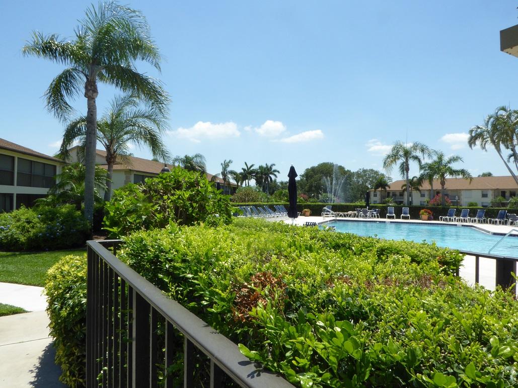 602 Pinecrest Circle, Unit B Jupiter, FL 33458 - Photo 17 of 19 a view of swimming pool from a balcony