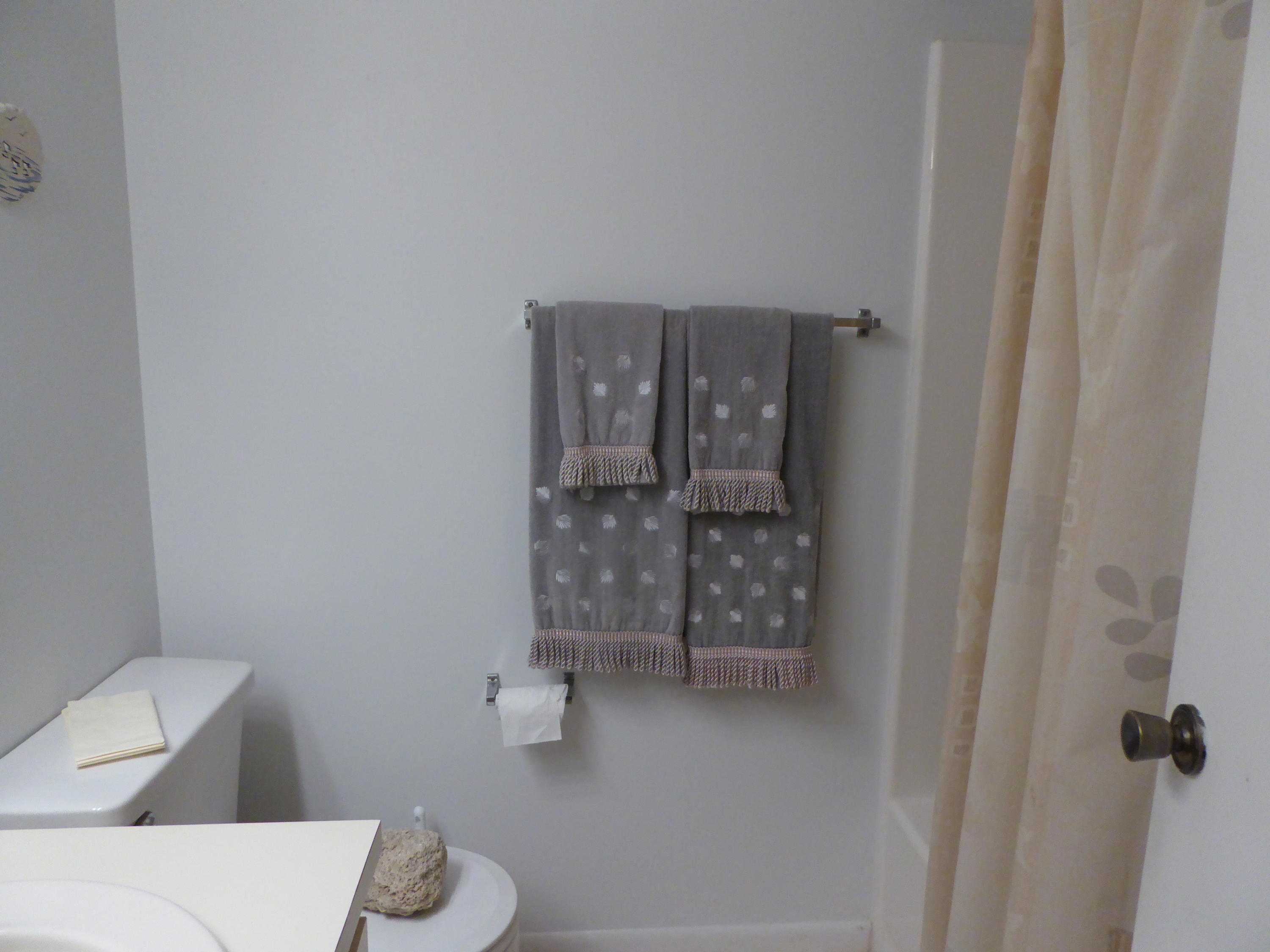 602 Pinecrest Circle, Unit B Jupiter, FL 33458 - Photo 6 of 19 a bathroom with a toilet and a shower