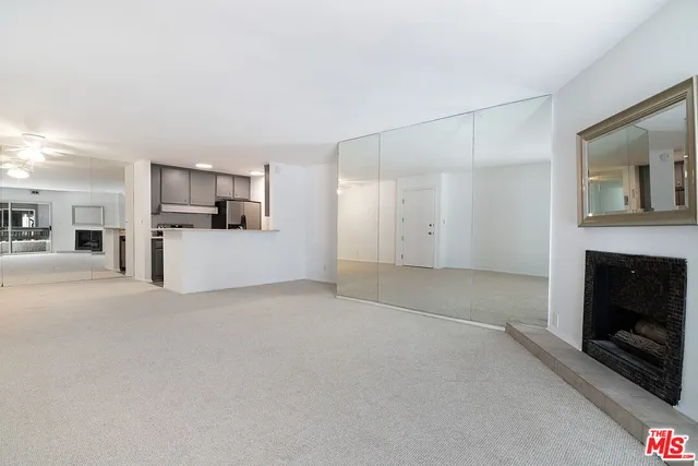 a view of a livingroom with a fireplace