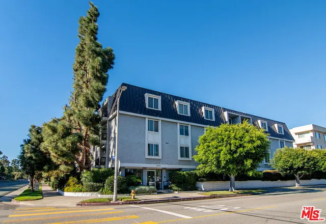 a view of a building with a street