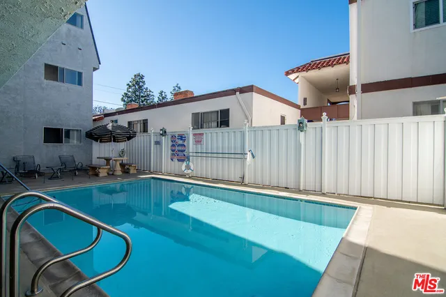 a view of a house with a swimming pool