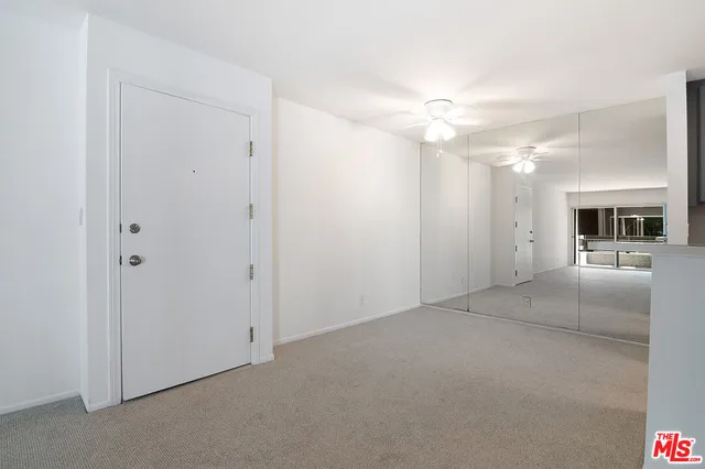 a view of a livingroom with a furniture