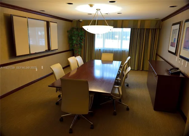 a view of a room with wooden door