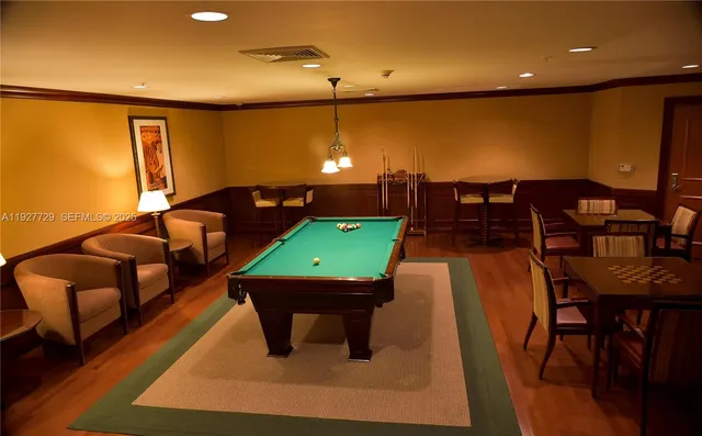 a view of a wooden house with a swimming pool