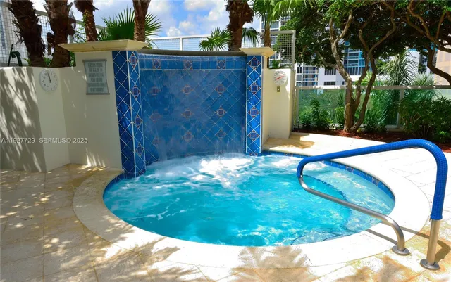 a view of a chairs and table in a patio