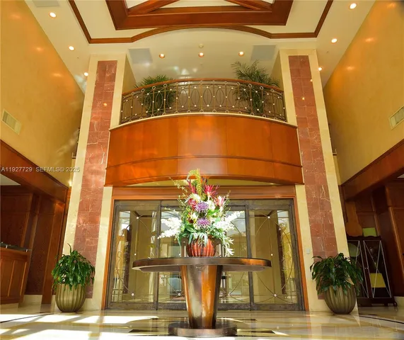 a view of a garden with a apartment