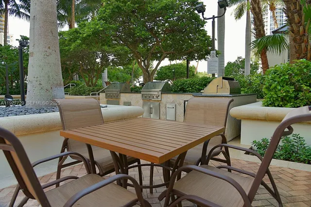 a view of wooden fence and trees