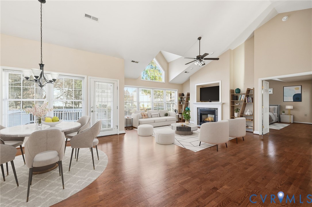 102 Creek Point Court Colonial Heights, VA 23834 - Photo 13 of 45 a view of a dining room with furniture window and wooden floor