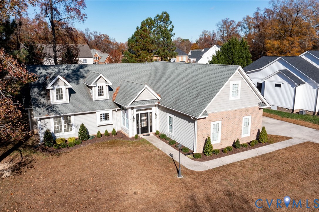 102 Creek Point Court Colonial Heights, VA 23834 - Photo 2 of 45 a view of house with yard and trees in the background