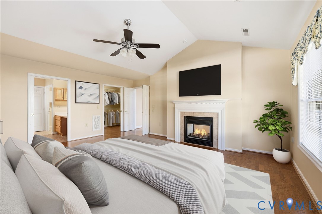 102 Creek Point Court Colonial Heights, VA 23834 - Photo 25 of 45 a living room with furniture a fireplace and a flat screen tv