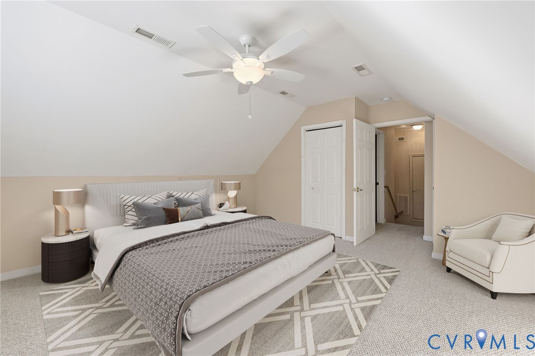 102 Creek Point Court Colonial Heights, VA 23834 - Photo 33 of 45 a bedroom with a bed and a chandelier