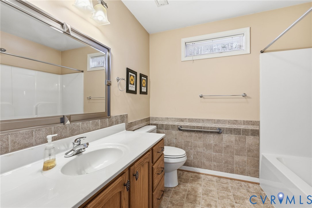 102 Creek Point Court Colonial Heights, VA 23834 - Photo 34 of 45 a bathroom with a sink toilet and shower
