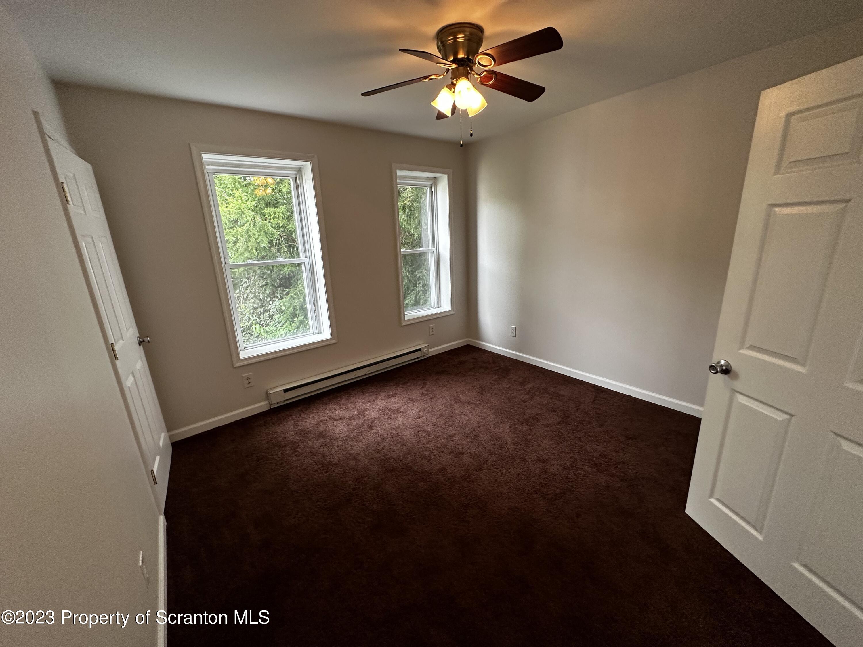 313 East Elm Street Scranton, PA 18505 - Photo 6 of 6 a view of an empty room with a window