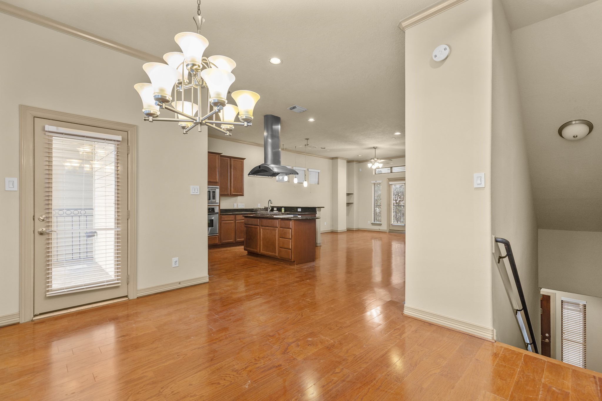 1607 Bass Street, Unit B Houston, TX 77007 - Photo 16 of 39 a view of a kitchen with a sink stainless steel appliances and cabinets