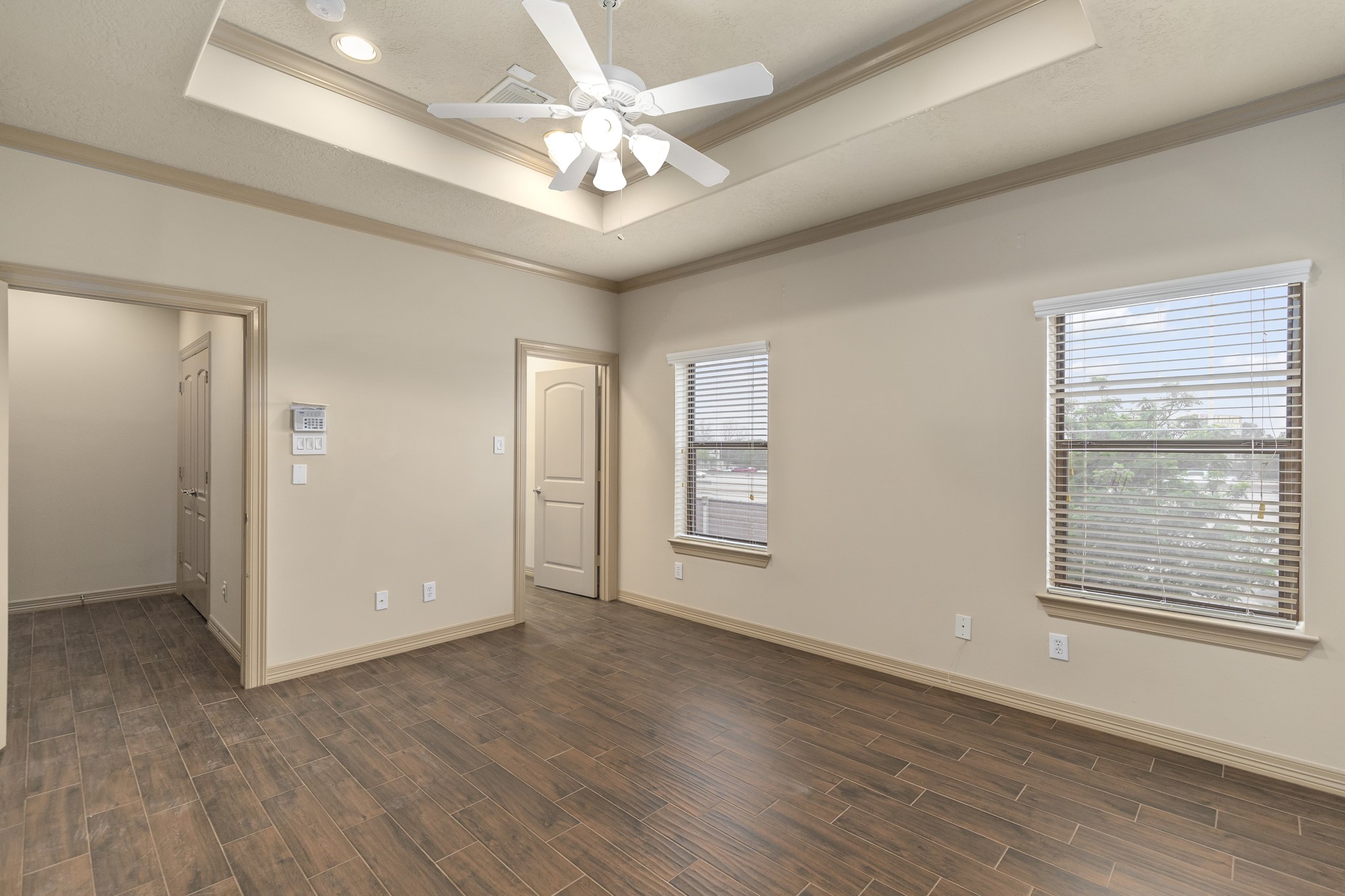 1607 Bass Street, Unit B Houston, TX 77007 - Photo 24 of 39 a view of an empty room with a window and wooden floor