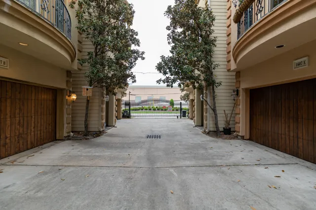 a view of a car park in front of house