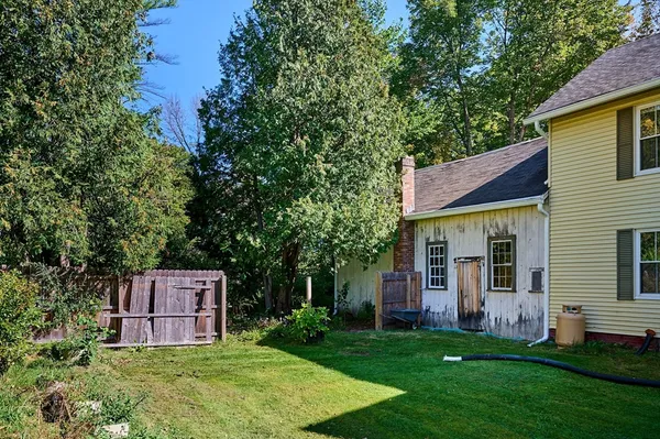 an aerial view of a garden with an outdoor seating