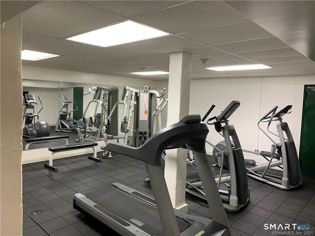 700 Summer Street, Unit 1M Stamford, CT 06901 - Photo 13 of 22 a view of a room with gym equipment