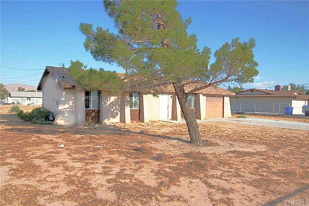13341 Algonquin Road Apple Valley, CA 92308 - Photo 1 of 1 The Home Faces West and is Located in a Very Desirable Area. The entire Lot is fenced.