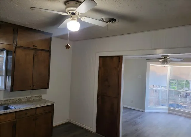 a view of an empty room and window