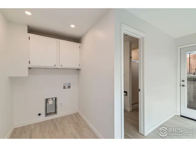 a view of kitchen with wooden floor