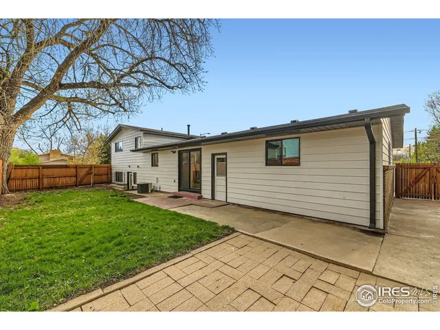 a view of a backyard with a garden