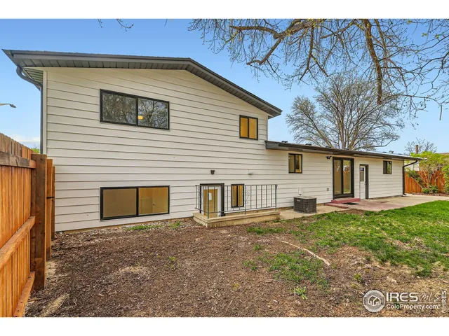 a house view with a backyard space
