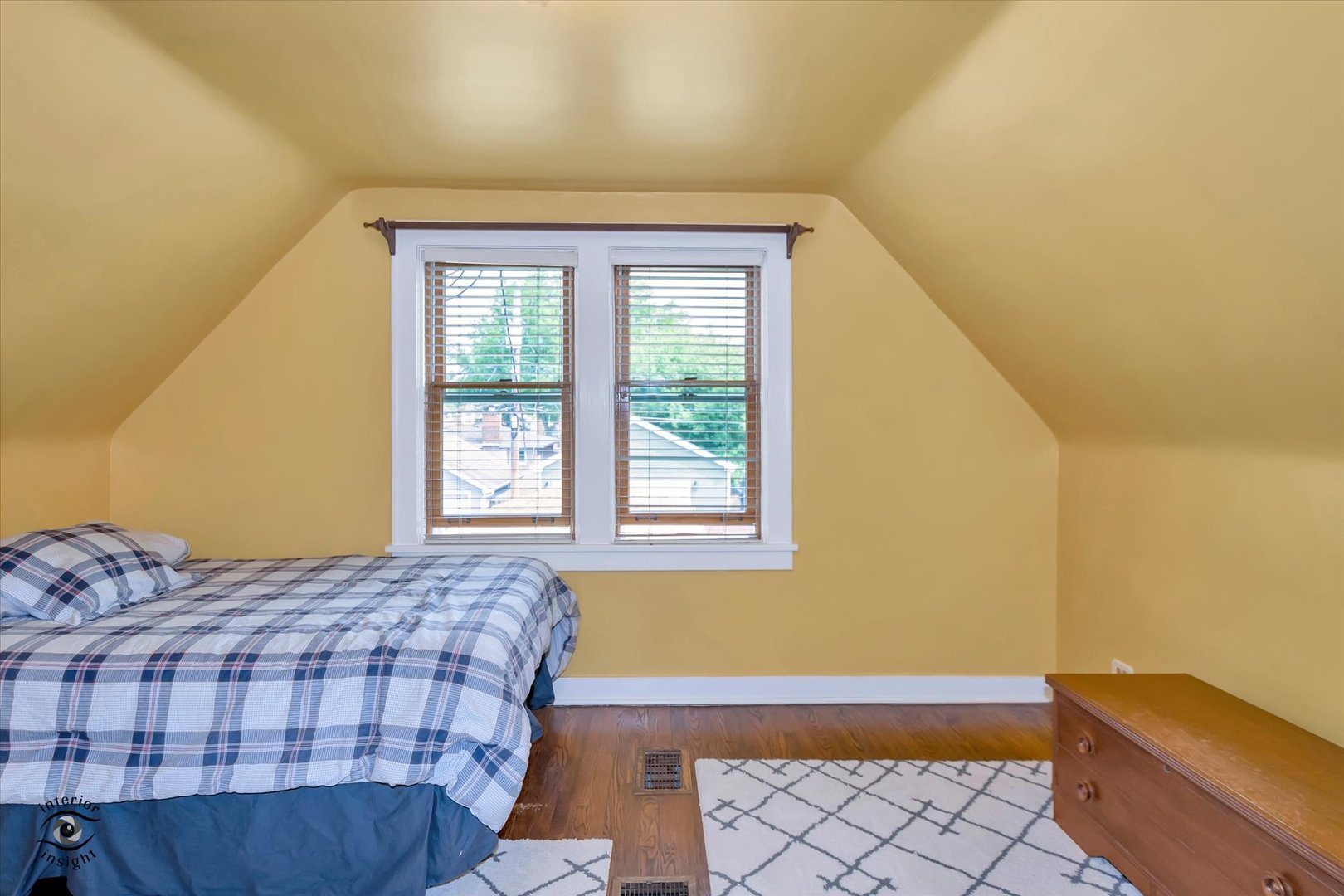 2546 West 110th Street Chicago, IL 60655 - Photo 19 of 26 a bedroom with a bed and a window