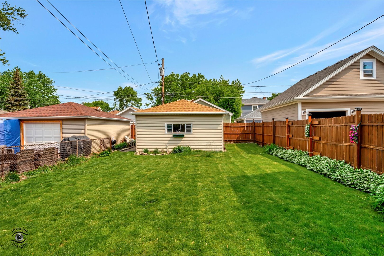 2546 West 110th Street Chicago, IL 60655 - Photo 23 of 26 a front view of house with yard and green space