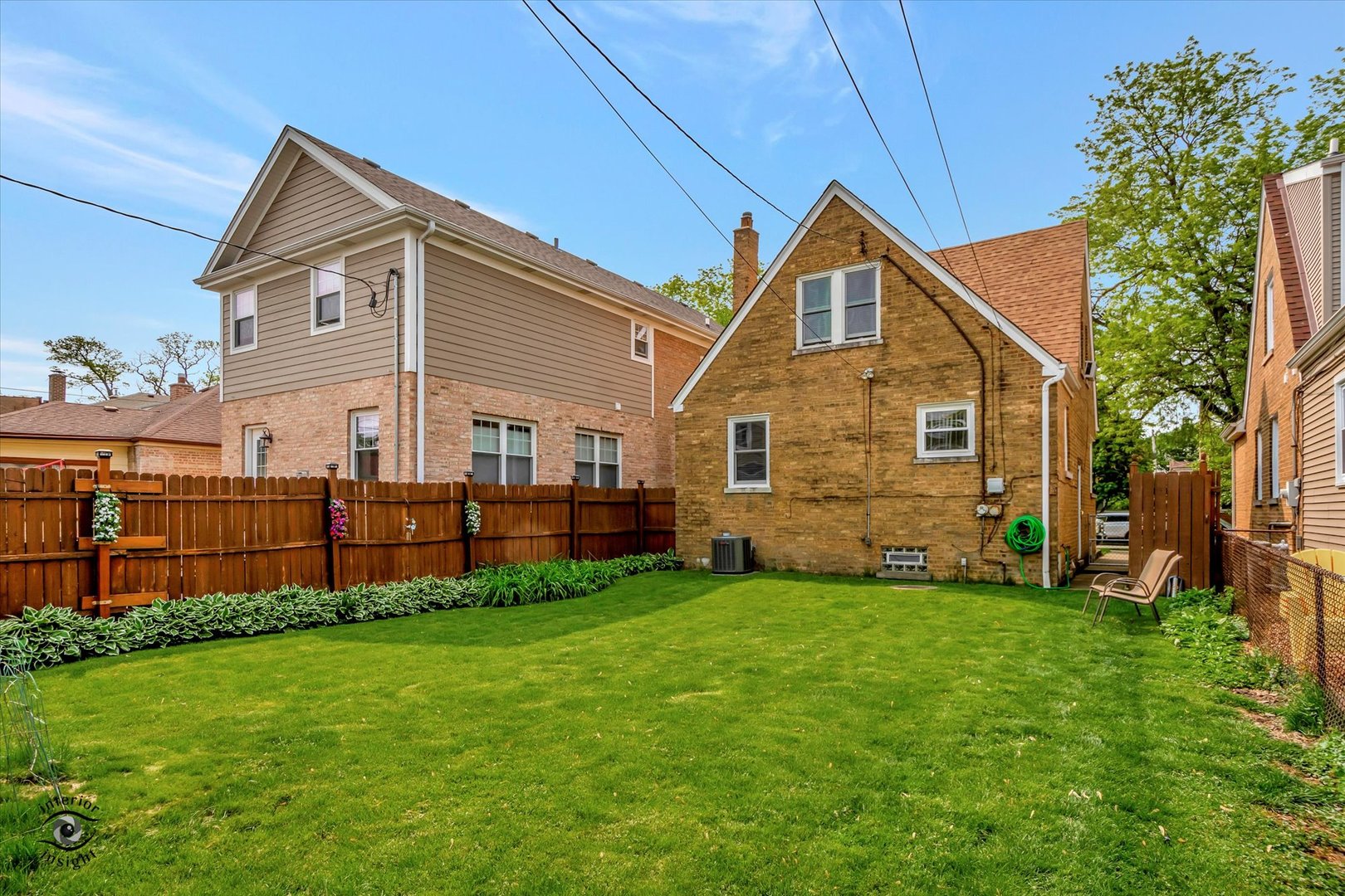 2546 West 110th Street Chicago, IL 60655 - Photo 25 of 26 a front view of house with yard and green space
