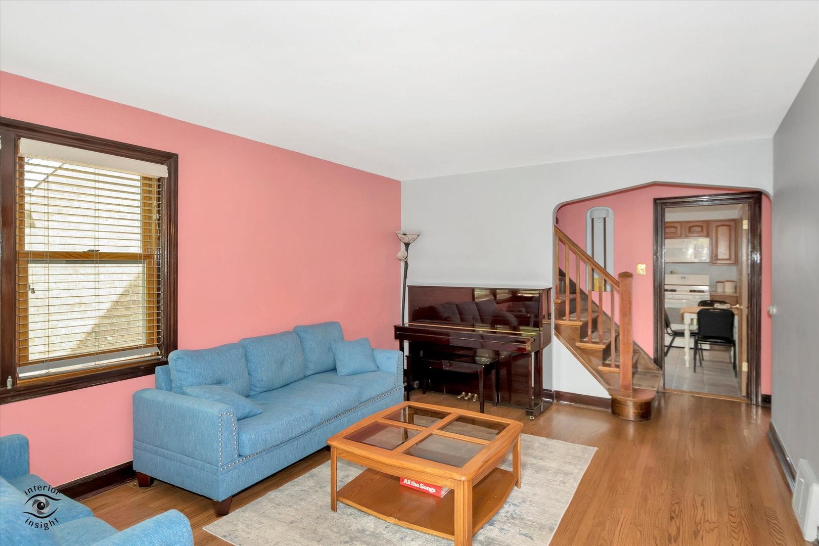 2546 West 110th Street Chicago, IL 60655 - Photo 5 of 26 a living room with furniture a rug and a window