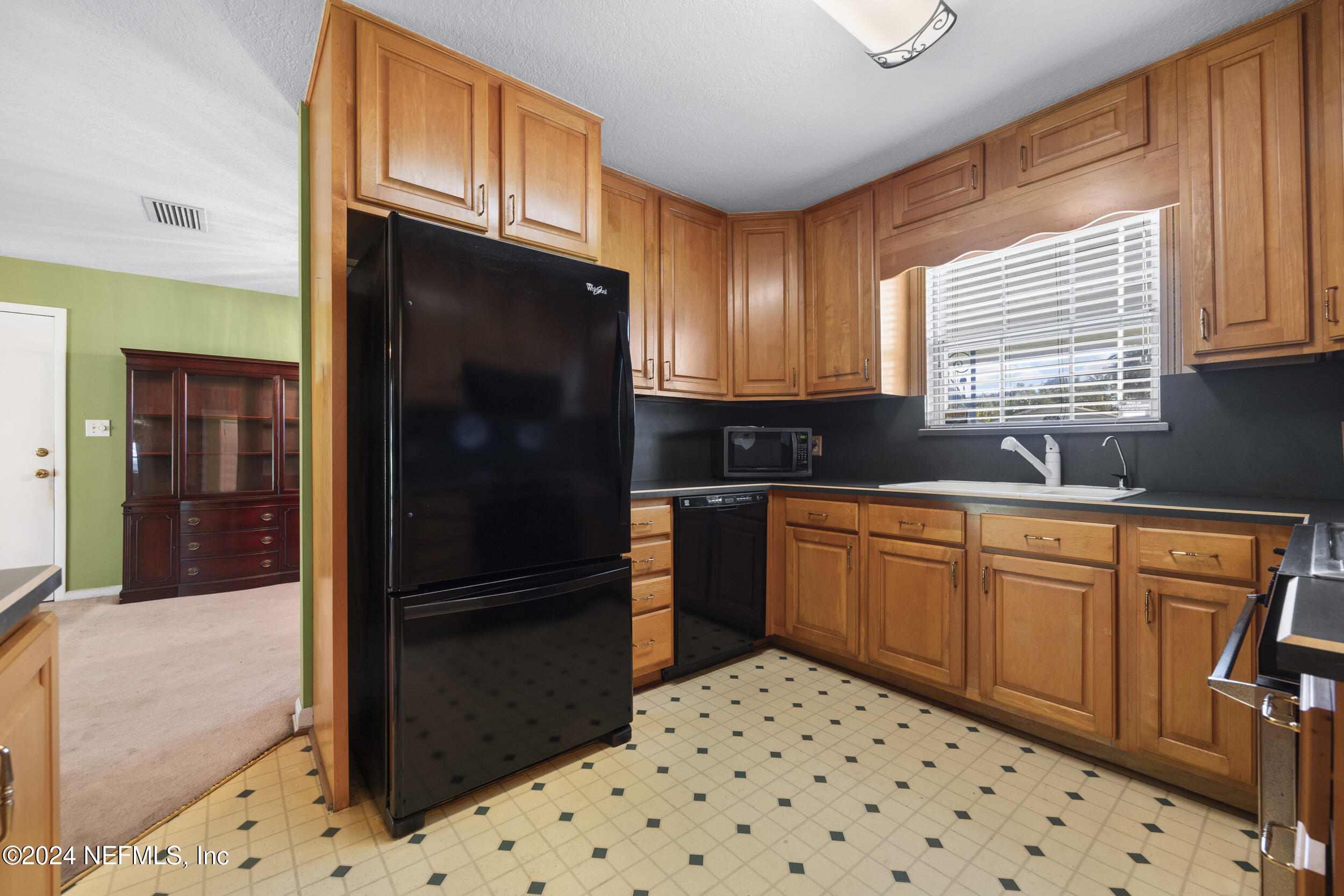 7729 Cayman Road Jacksonville, FL 32216 - Photo 8 of 25 _therealestateographers_030