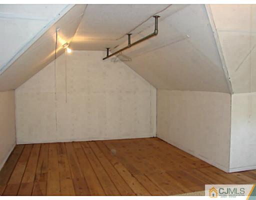 422 Ridge Road Dayton, NJ 08810 - Photo 12 of 24 a view of a room with wooden floor
