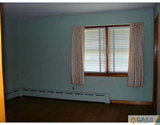 422 Ridge Road Dayton, NJ 08810 - Photo 24 of 24 a view of a window in an empty room