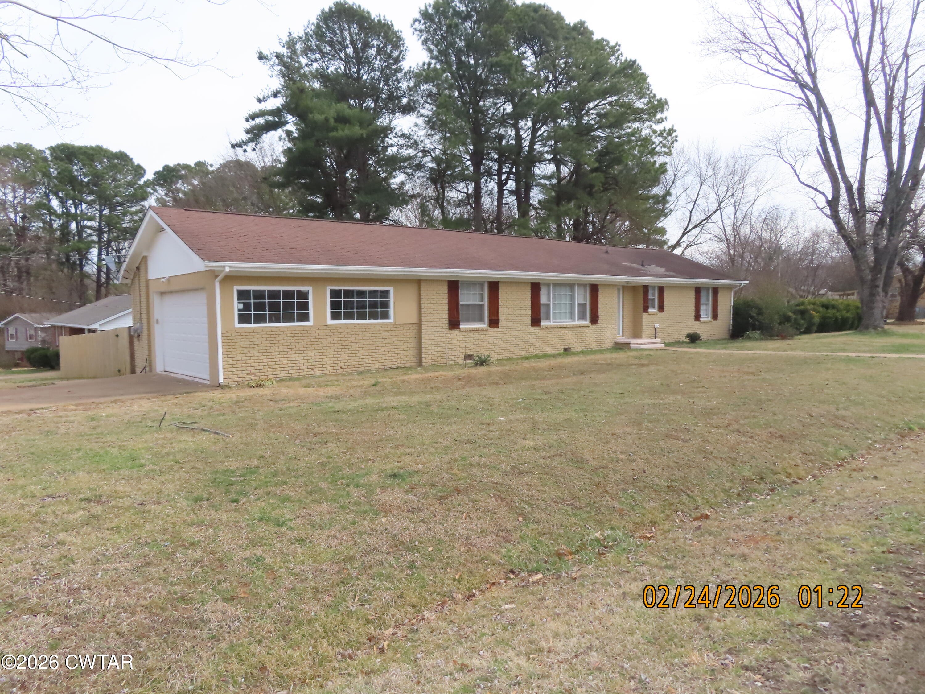 200 Rockwell Road Jackson, TN 38305 - Photo 20 of 20 front view of house with a yard