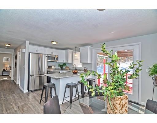 19 Ramshorn Road Dudley, MA 01571 - Photo 8 of 29 a kitchen with a table and chairs