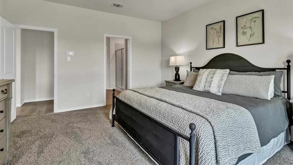 124 Pheasant Run Road Terrell, TX 75160 - Photo 27 of 35 Carpeted bedroom featuring light-toned walls and white trim