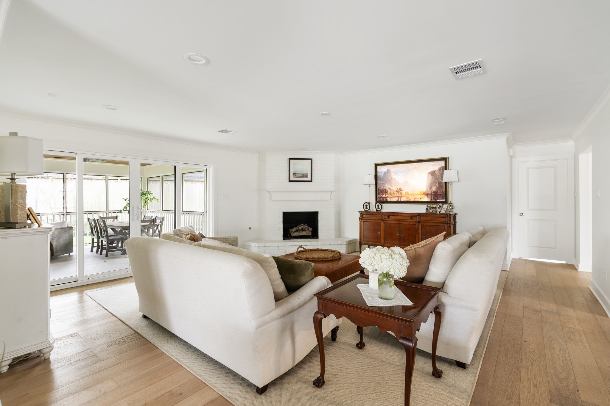 4902 Candleleaf Drive Houston, TX 77018 - Photo 11 of 32 Large windows allow natural light to move through the space throughout the day.