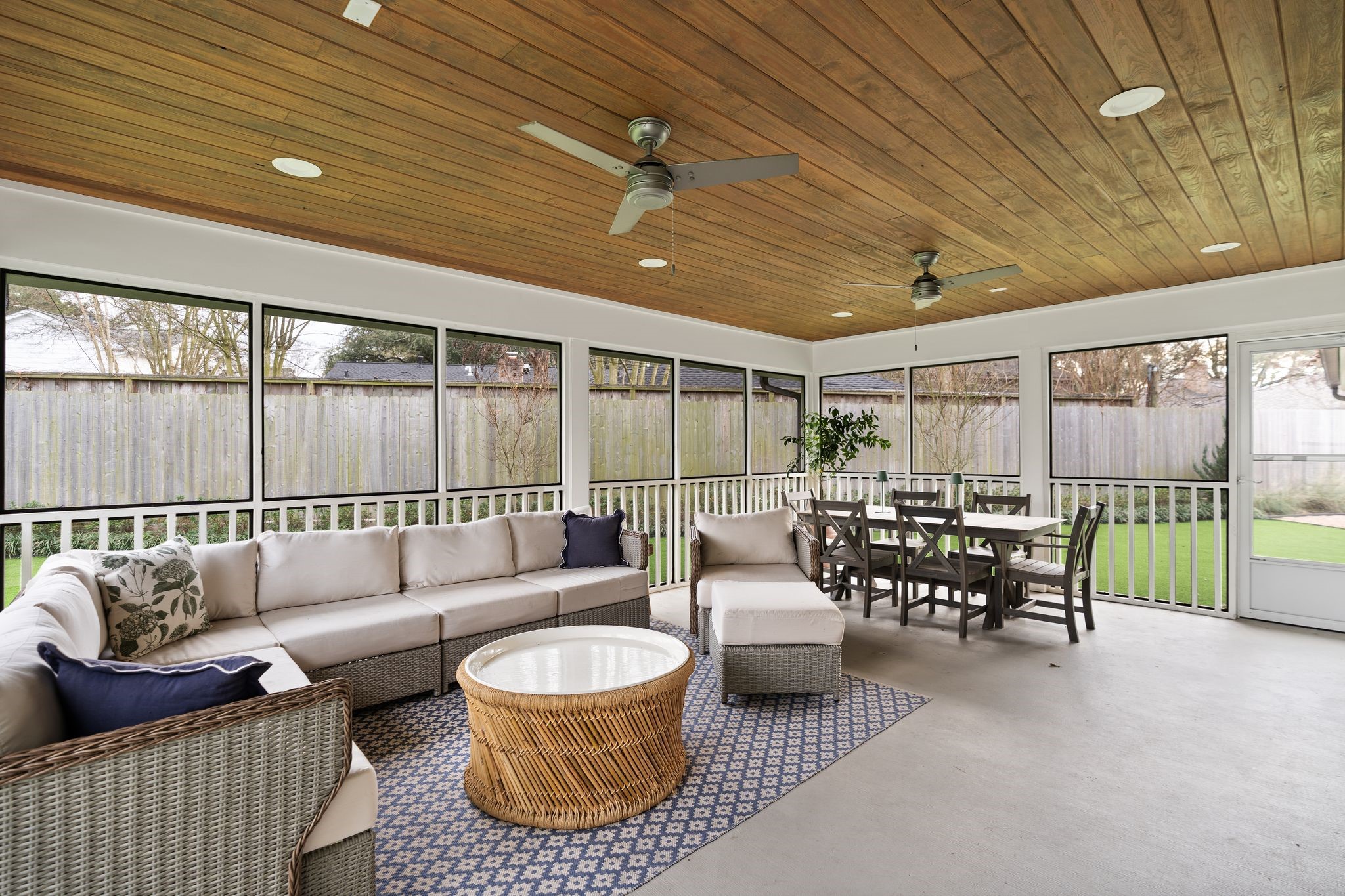 4902 Candleleaf Drive Houston, TX 77018 - Photo 14 of 32 The expansive screened porch features painted concrete floors, paneled ceiling, and overhead fans designed for year-round comfort.